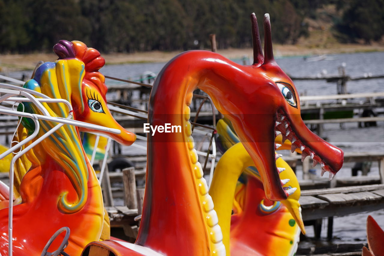 recreation, amusement park, park, water, day, no people, transportation, outdoors, vehicle, yellow, nature, mode of transportation, red