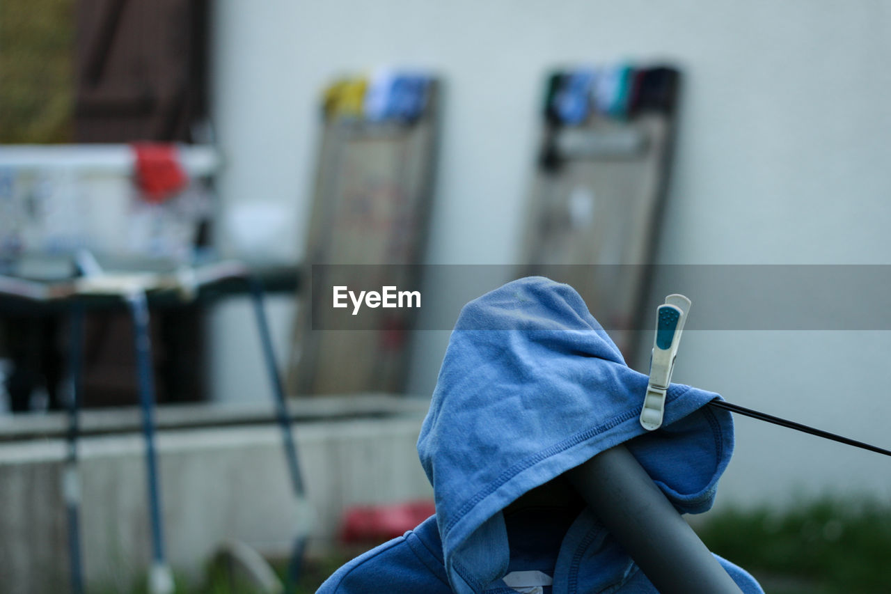 Hooded shirt drying on clothesline