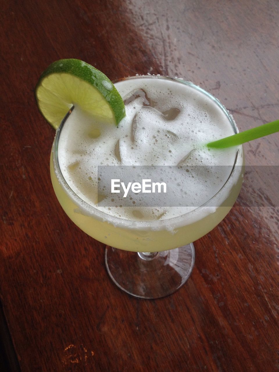 CLOSE-UP OF DRINK ON TABLE