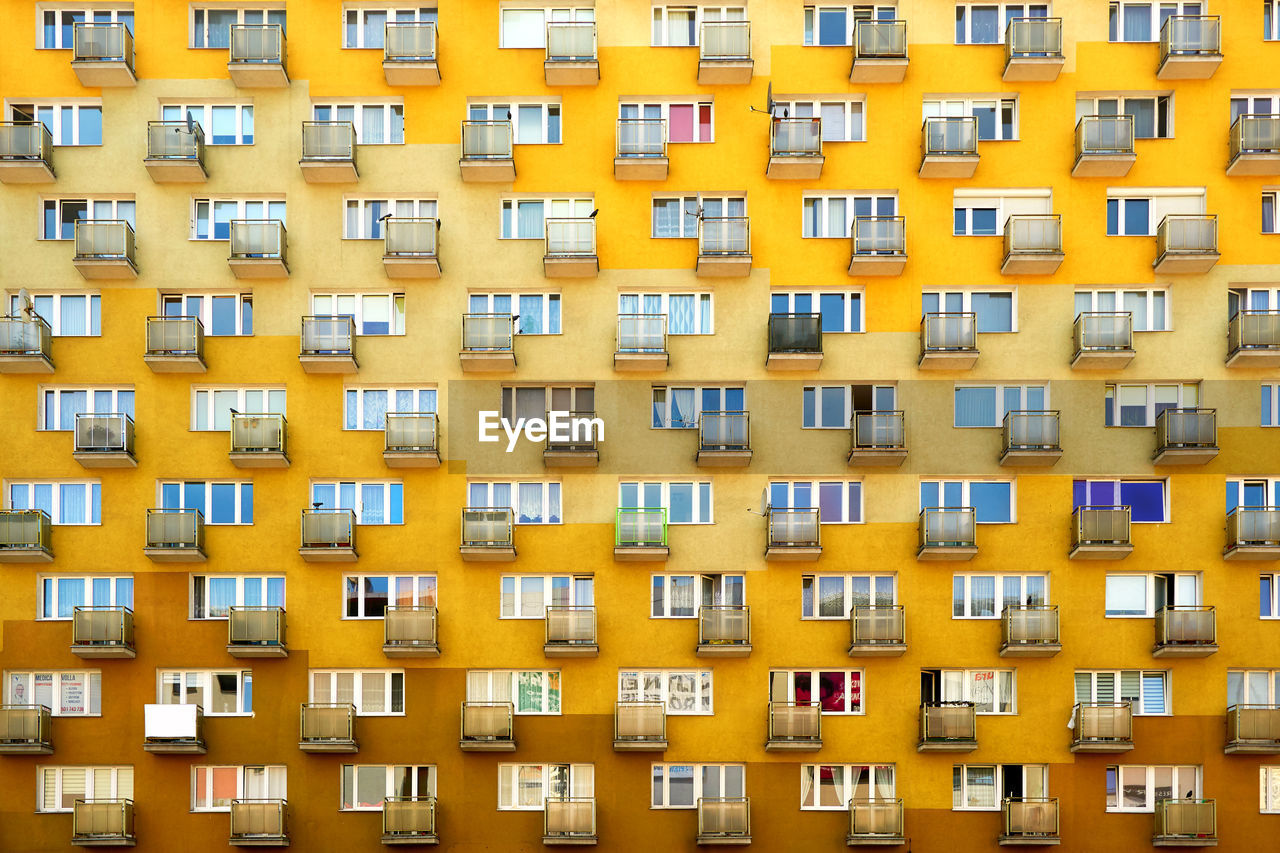 Full frame shot of orange residential building