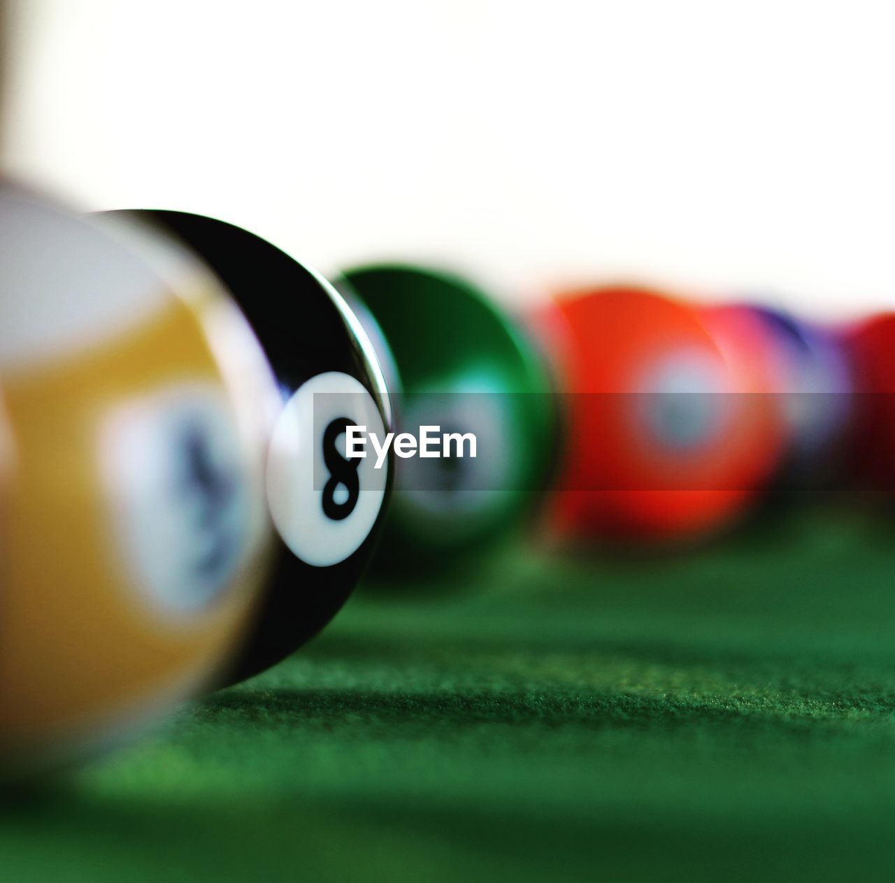 Close-up of pool balls on table