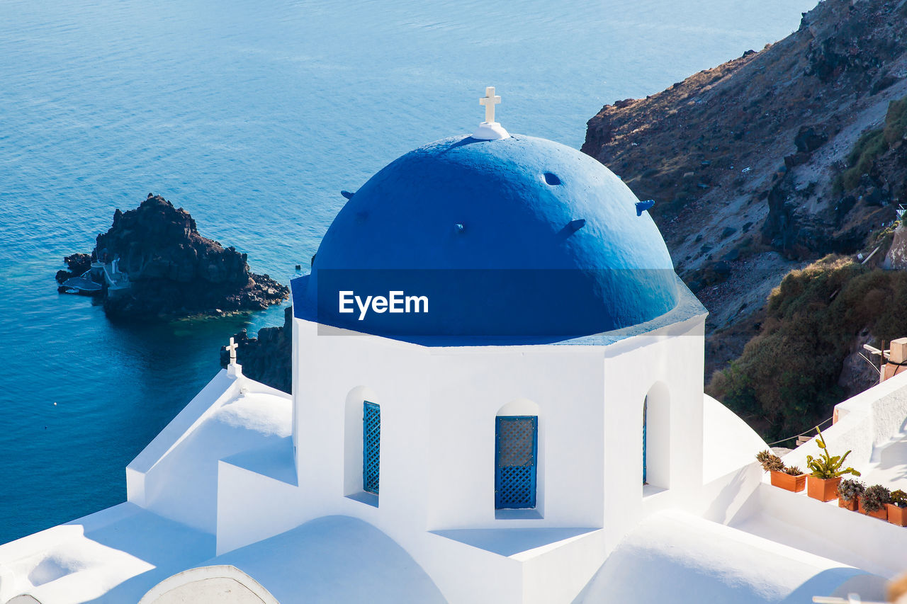 Traditional architecture of the churches of the oia city in santorini island