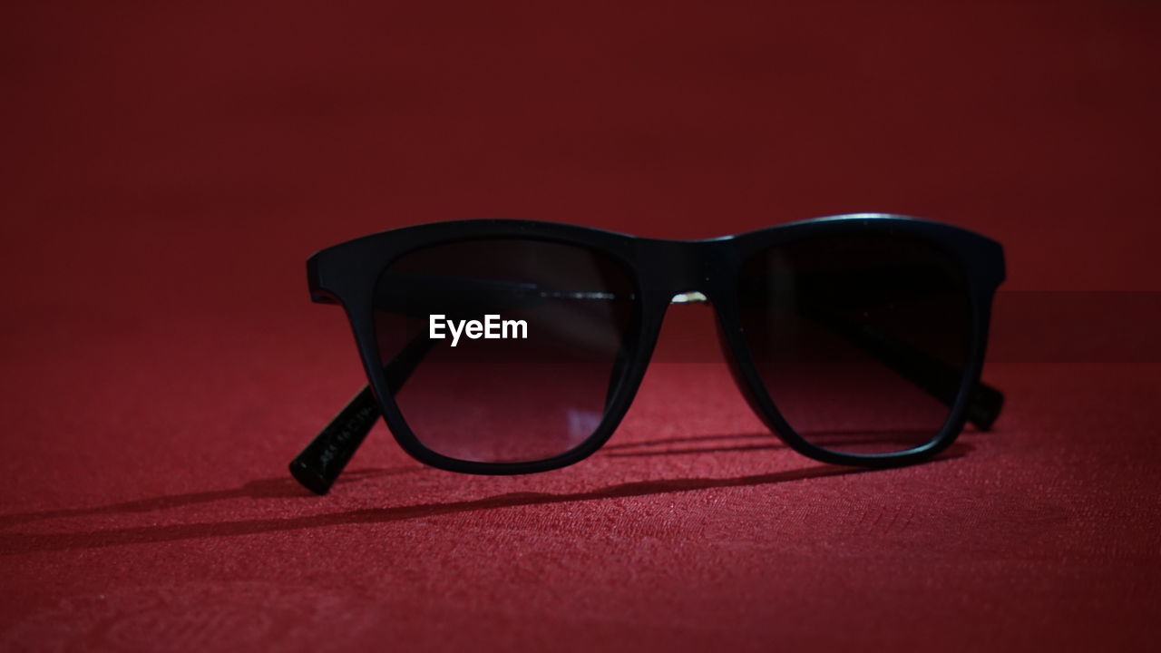 Close-up of sunglasses on table
