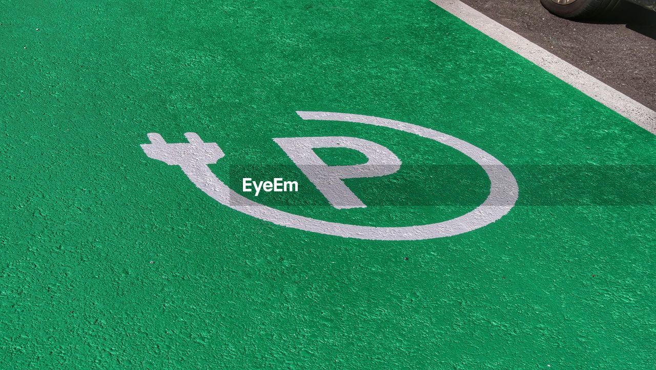 High angle view of parking sign for electrical cars