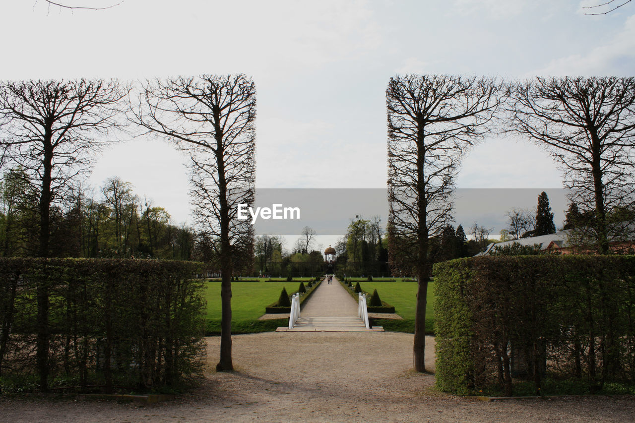 Topiaries at park against sky