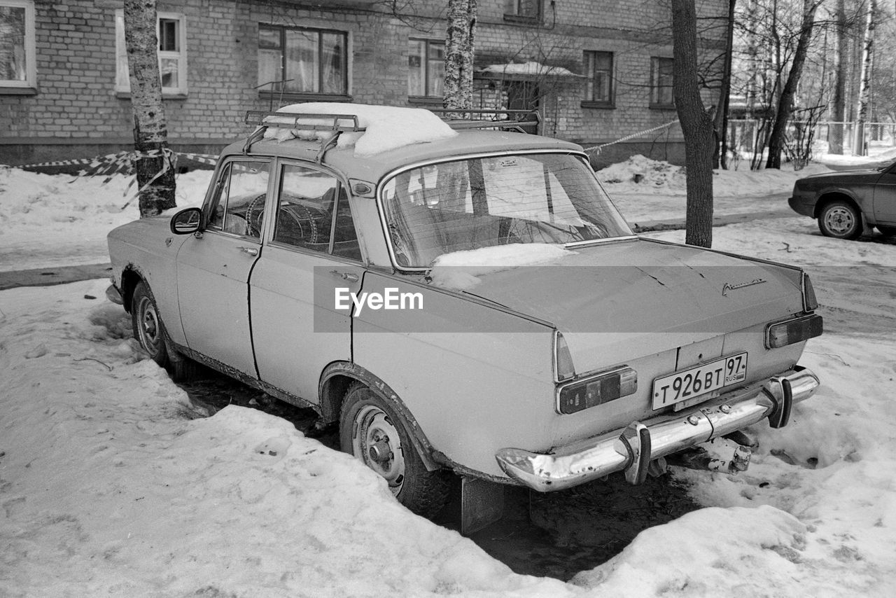 Abandoned car on snow