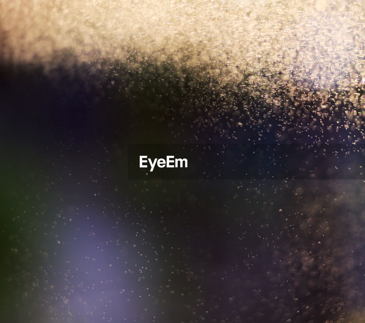 FULL FRAME SHOT OF RAINDROPS ON WINDOW