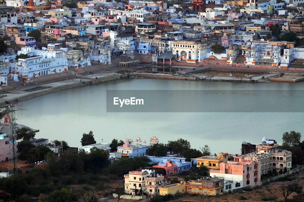 High angle view of lake amidst houses in pushkar