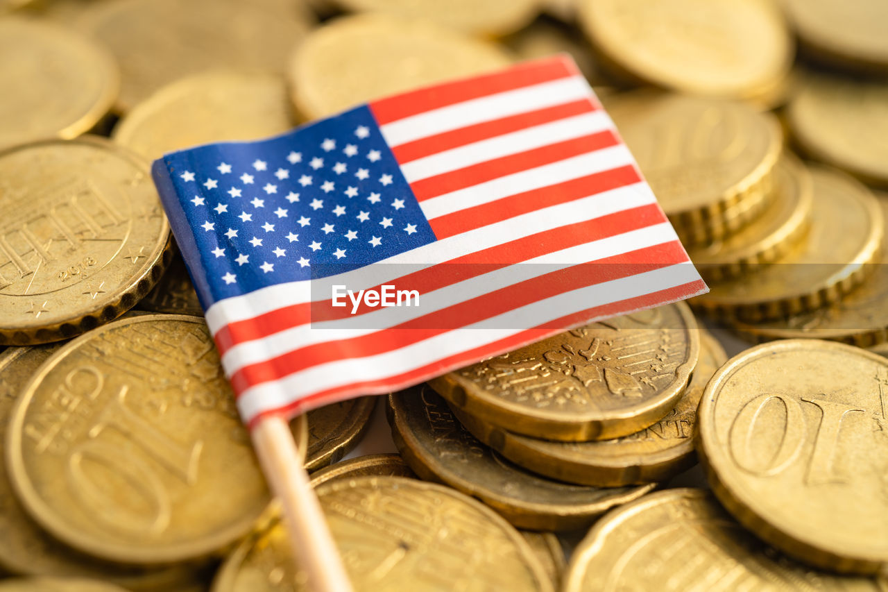 money, finance, coin, business, cash, currency, flag, wealth, close-up, money handling, gold, savings, patriotism, shape, large group of objects, no people, selective focus, exchange rate, abundance, heap, symbol