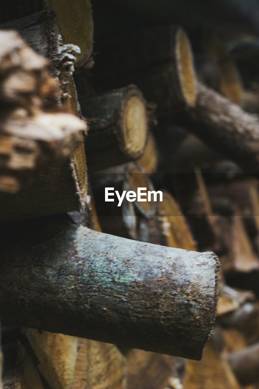 CLOSE-UP OF OLD WOODEN RAILING