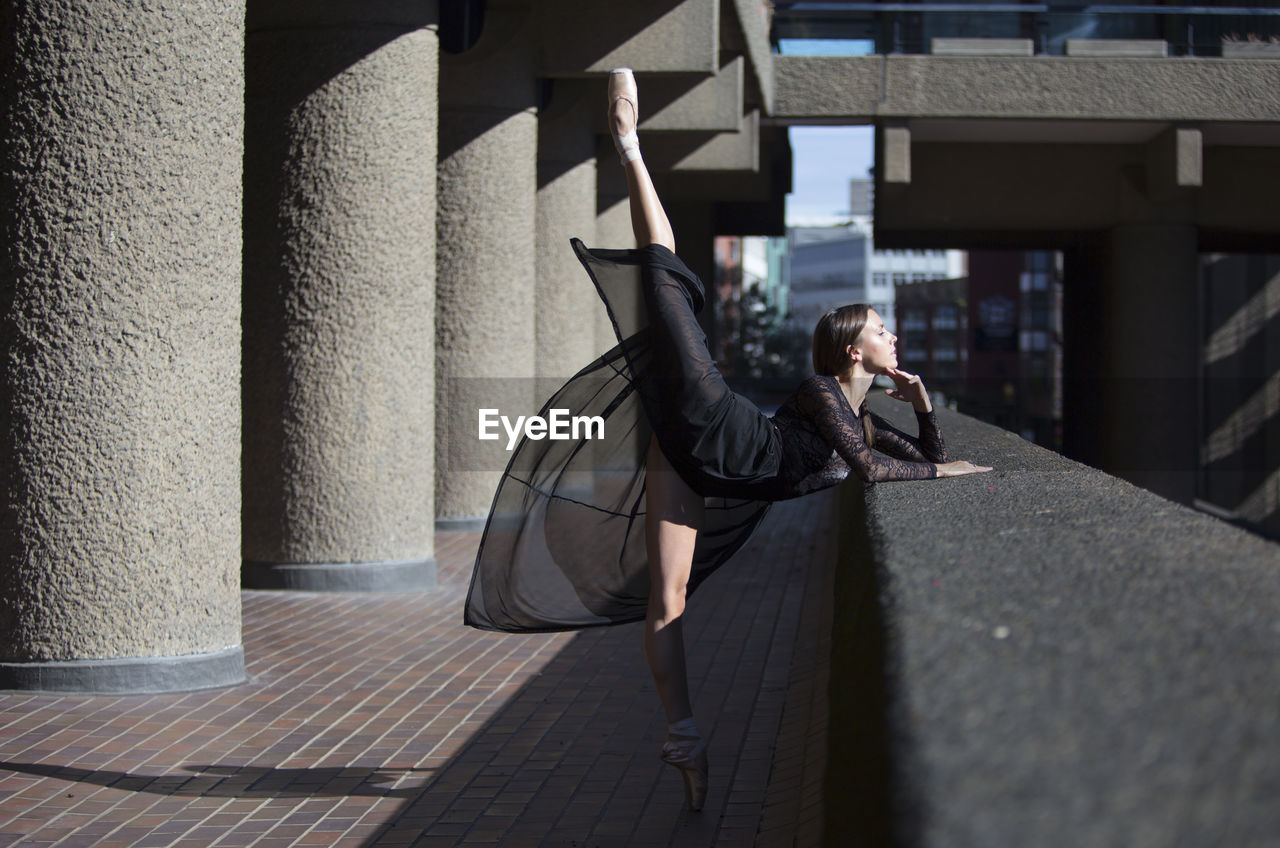 Ballet dancer dancing in city