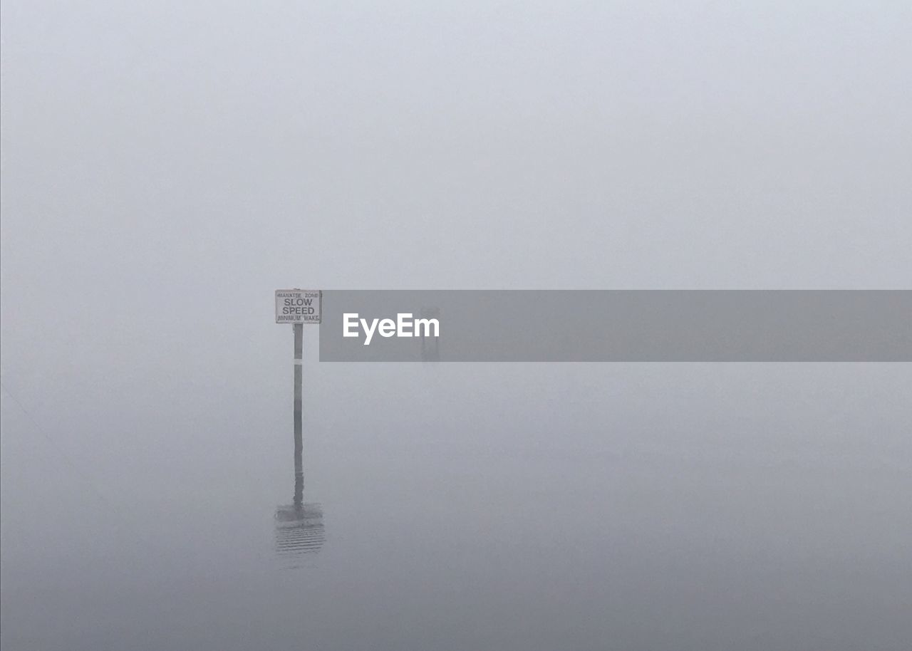 VIEW OF LAKE IN FOGGY WEATHER