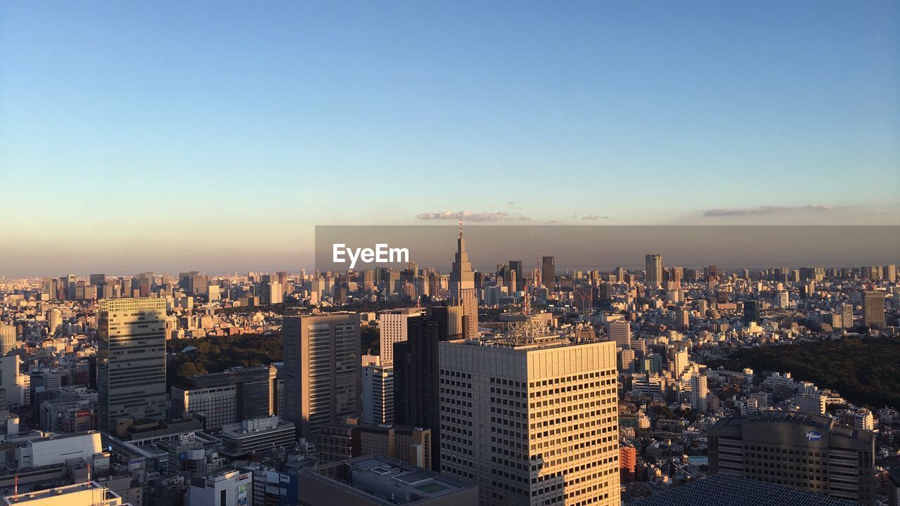 View of cityscape against clear sky