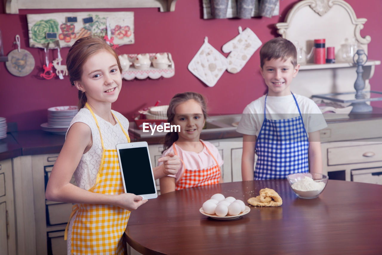 Portrait of smiling girl having food