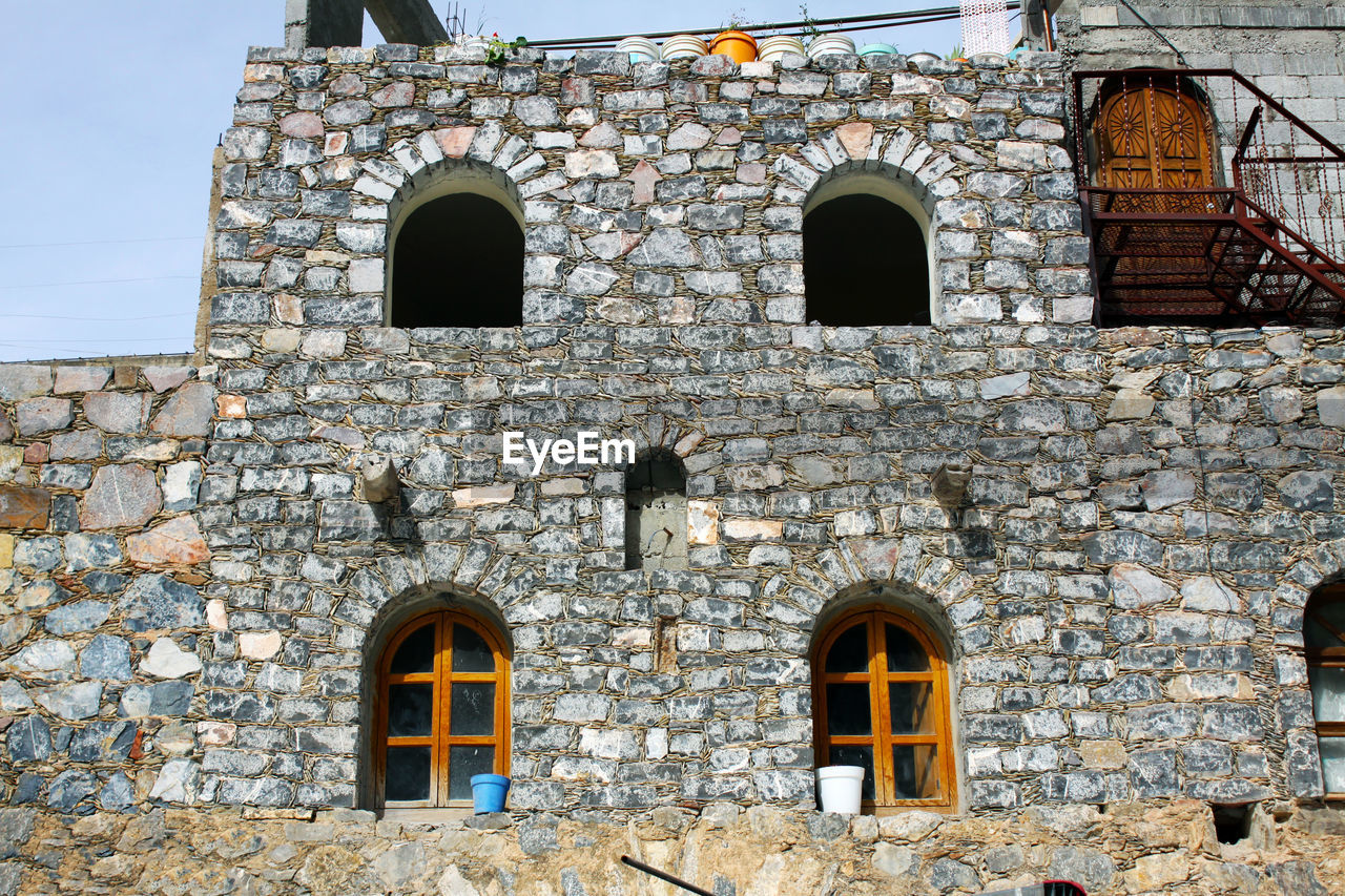 LOW ANGLE VIEW OF HISTORIC BUILDING