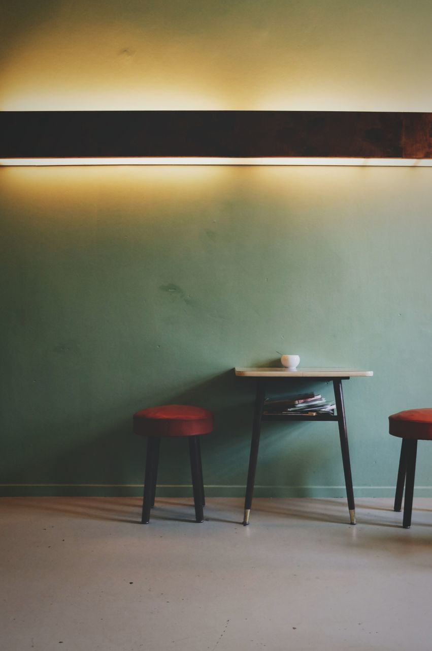 Chairs with table in house