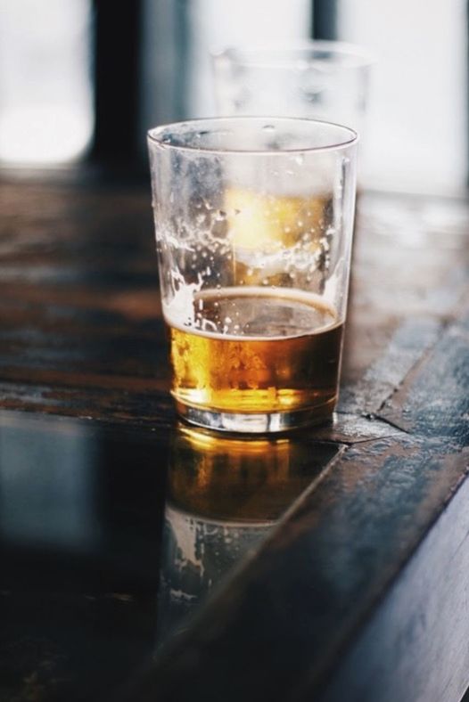 CLOSE-UP OF DRINK ON TABLE