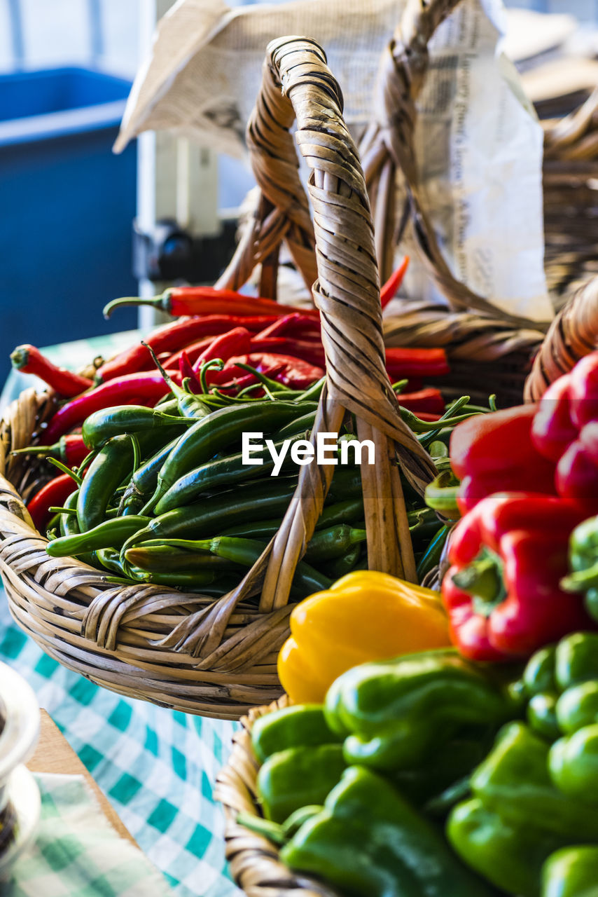 Close-up of chili and bell peppers for sale in market