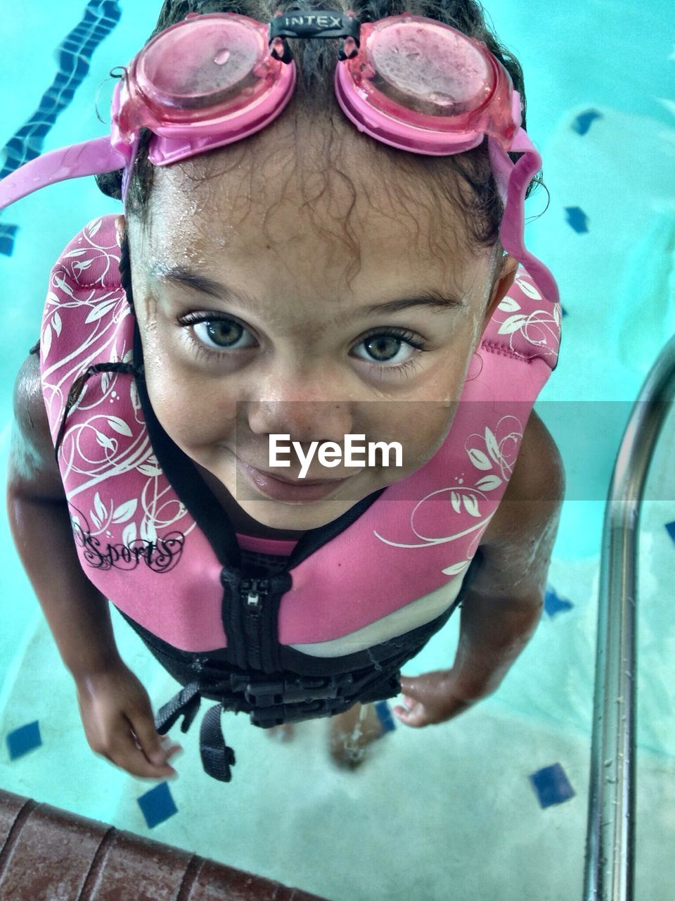 Girl at a swimming pool