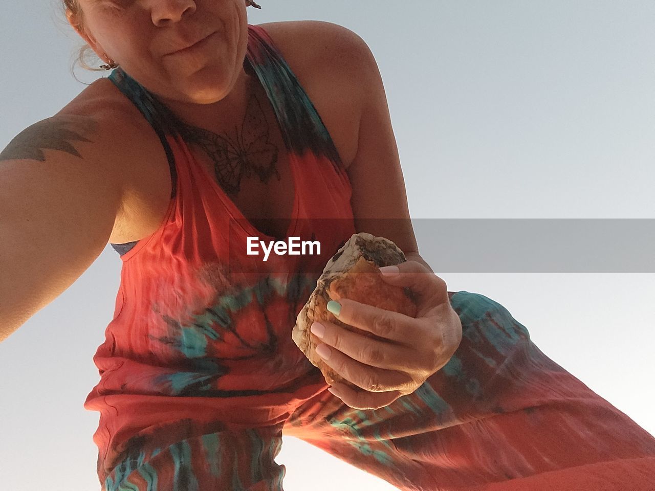 adult, one person, women, holding, lifestyles, nature, person, waist up, hand, sky, clothing, day, front view, arm, sports, emotion, portrait, leisure activity, female