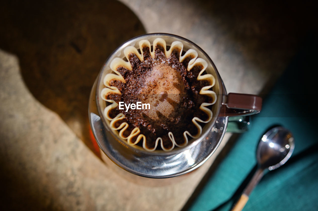 Closeup barista hot coffee drip maker