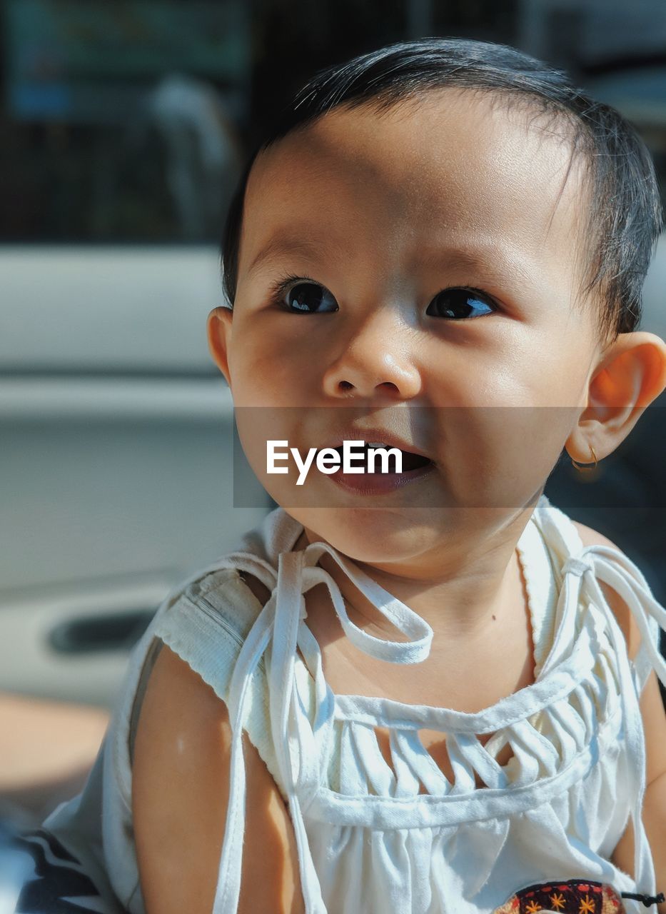 Close-up of cute baby looking up