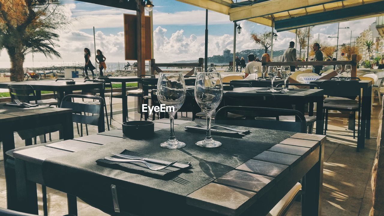 CHAIRS AND TABLE AT RESTAURANT