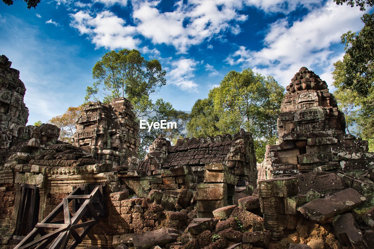 Preah khan temple site among the ancient ruins of angkor wat hindu temple complex in cambodia