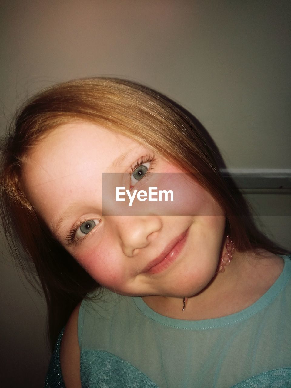 Portrait of smiling girl at home