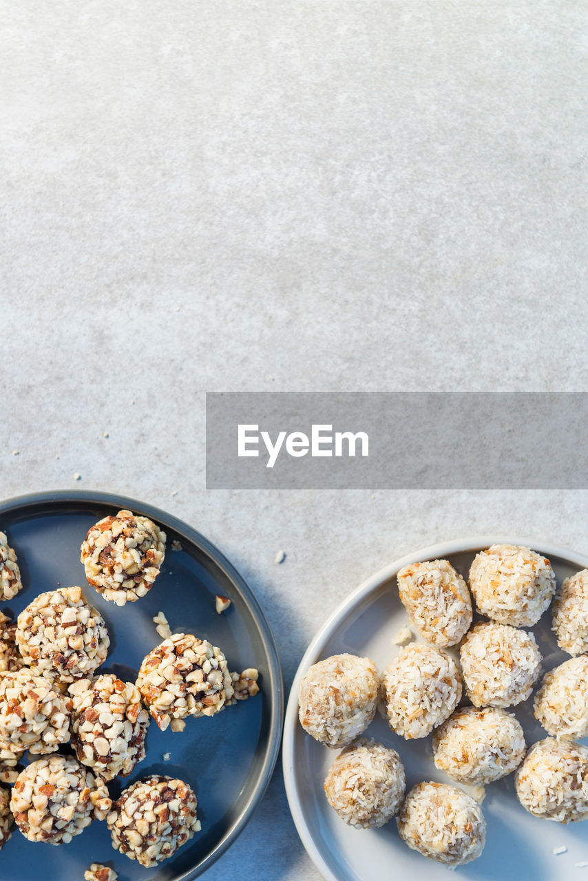 HIGH ANGLE VIEW OF VARIOUS FOOD IN BOWL ON TABLE