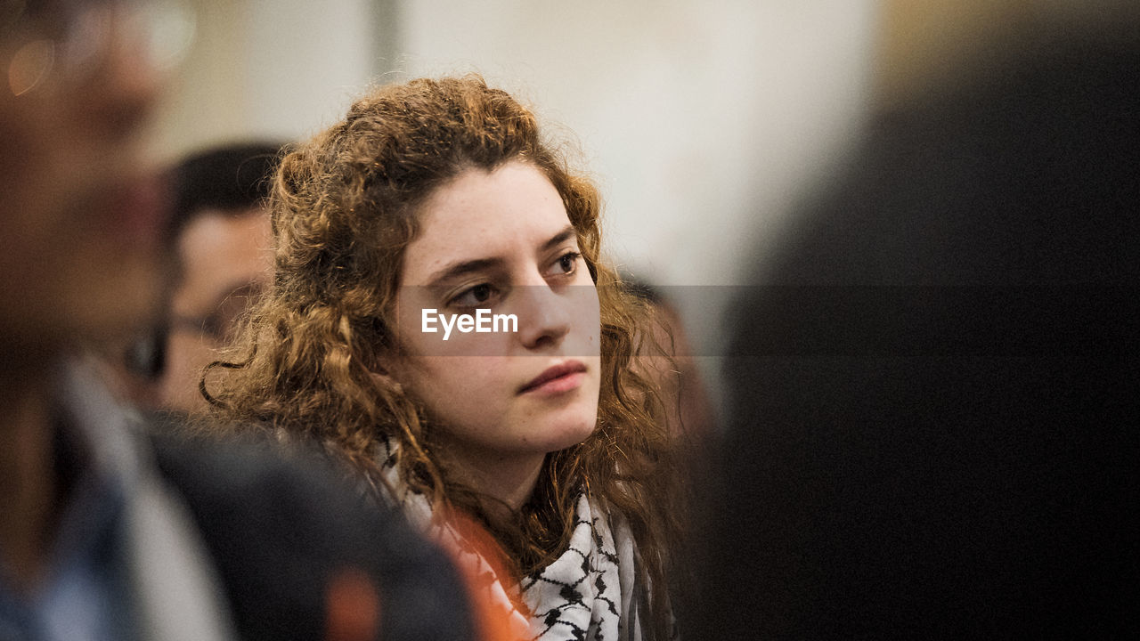 YOUNG WOMAN WITH HAIR