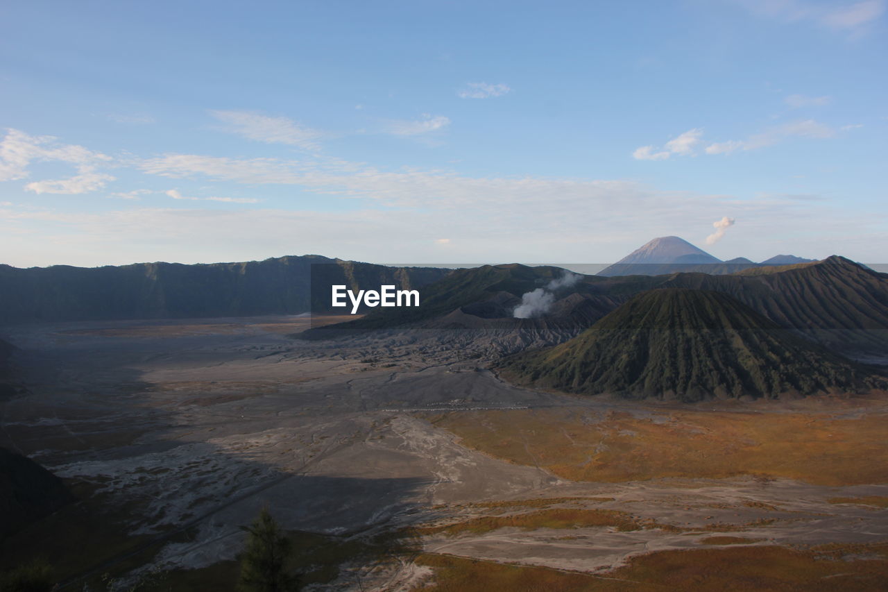 Scenic view of volcanic landscape against sky