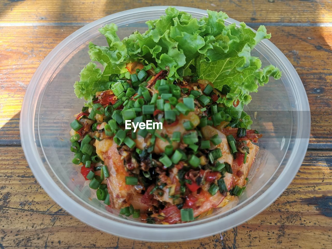 High angle view of chopped vegetables in bowl on table