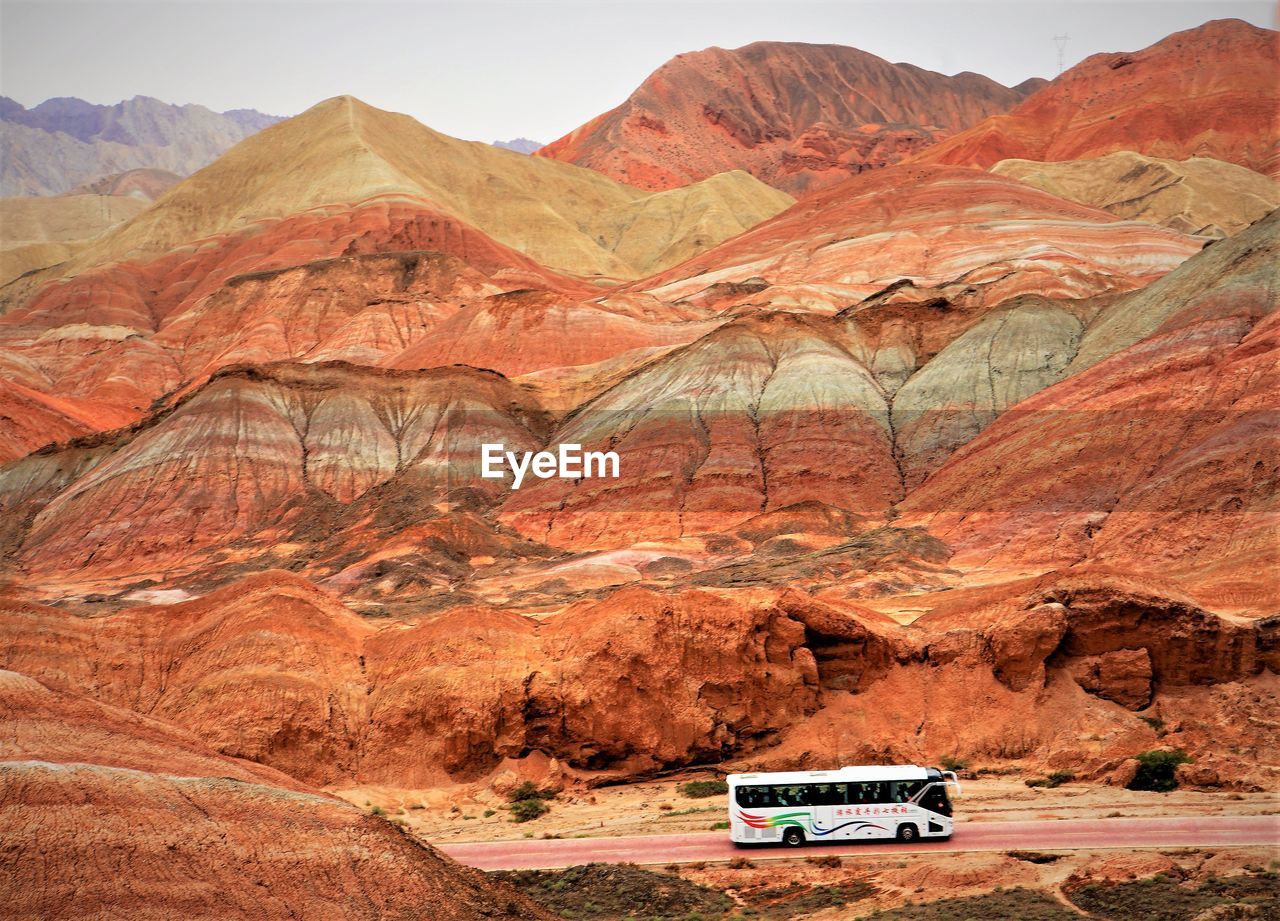 A road through the colorful mountain in zhangye national geopark