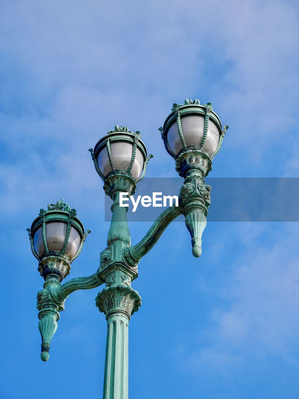 LOW ANGLE VIEW OF STREET LIGHTS AGAINST SKY