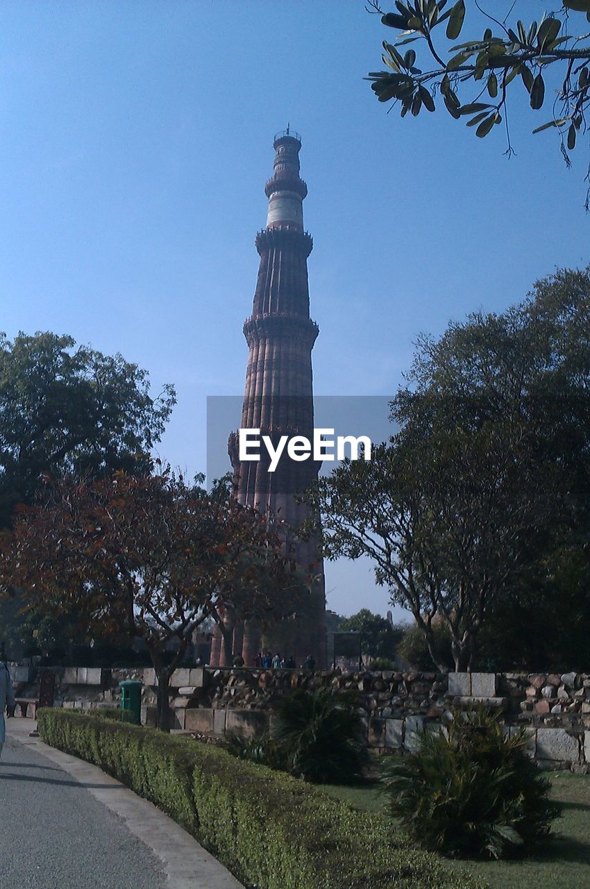 BUILT STRUCTURE AGAINST TREES