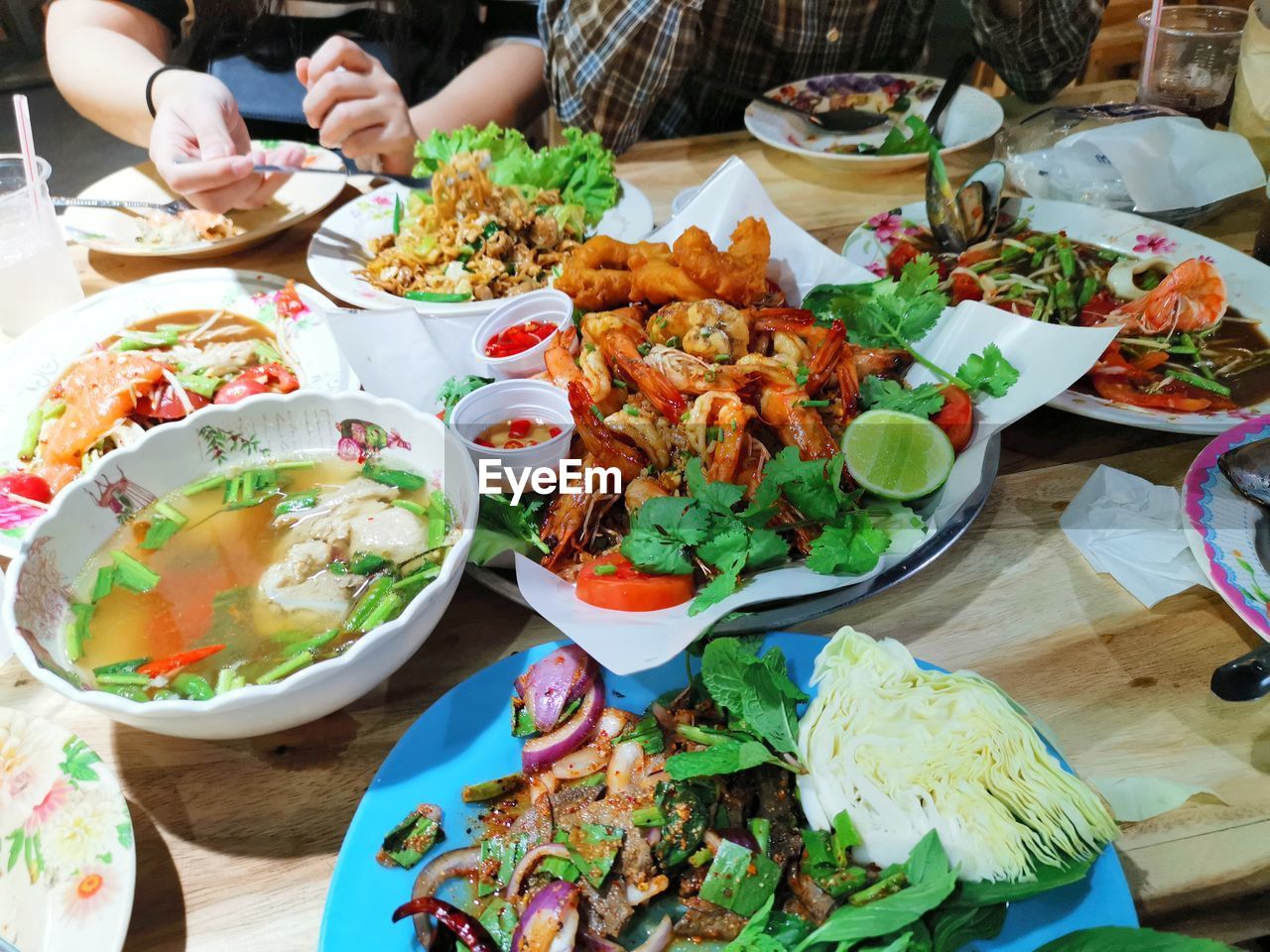 HIGH ANGLE VIEW OF FOOD SERVED IN RESTAURANT