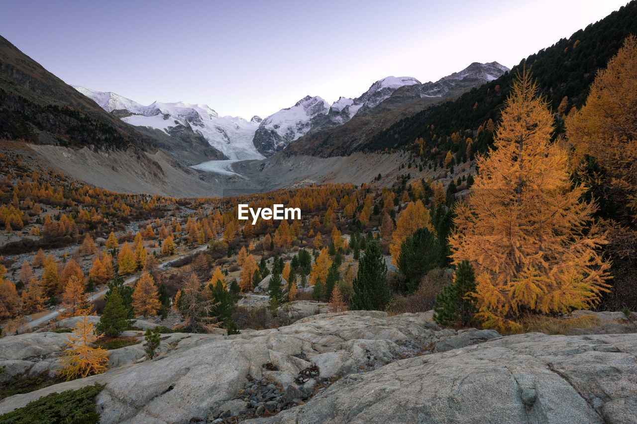 Scenic view of mountains against sky during winter