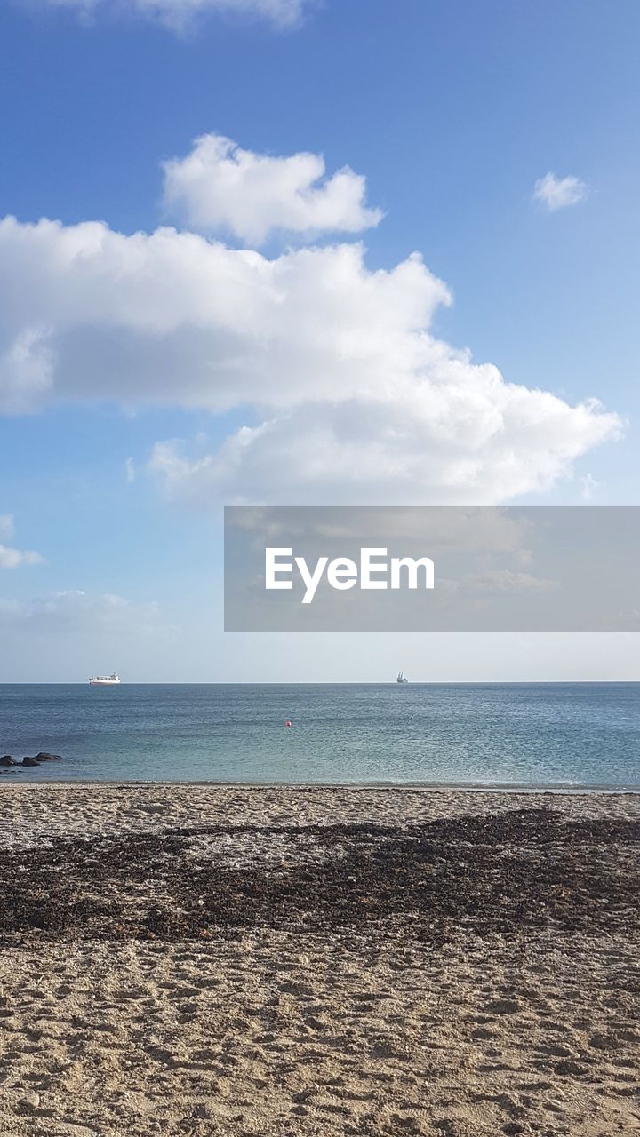 VIEW OF BEACH AGAINST SKY