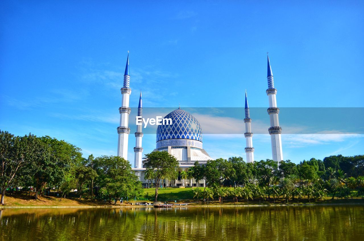 View of mosque against blue sky