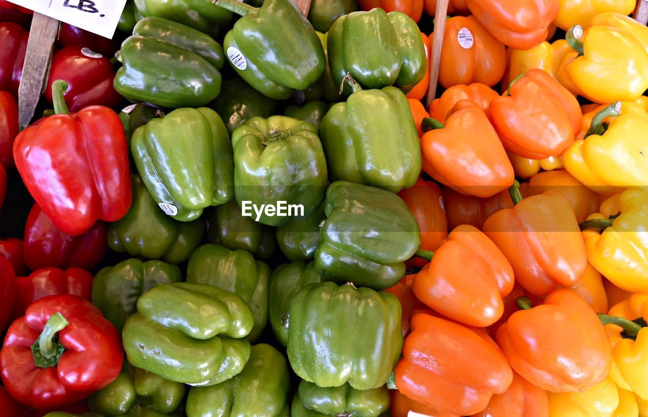 High angle view of various bell peppers at market