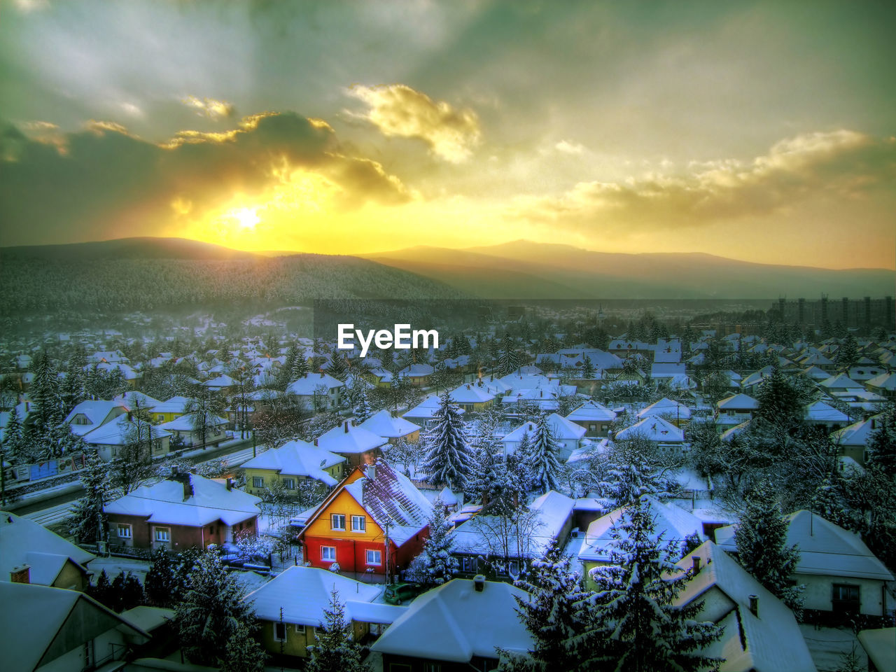 High angle view of buildings during sunset