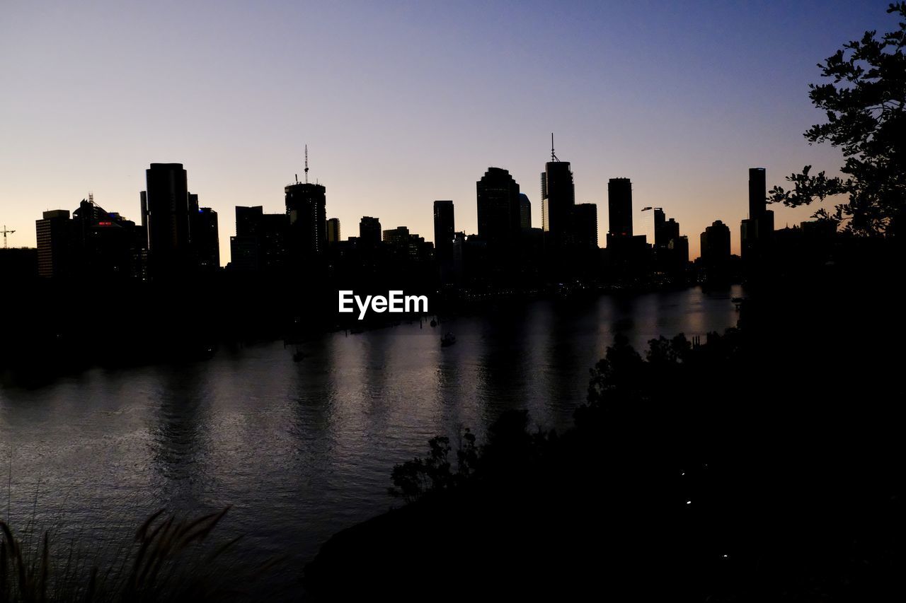 SILHOUETTE OF SKYSCRAPERS AT SUNSET