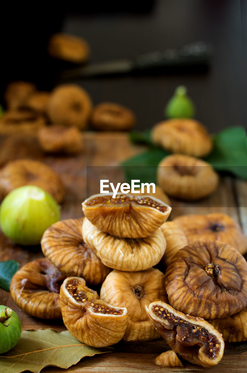 CLOSE-UP OF MUSHROOMS GROWING ON TABLE IN CAFE