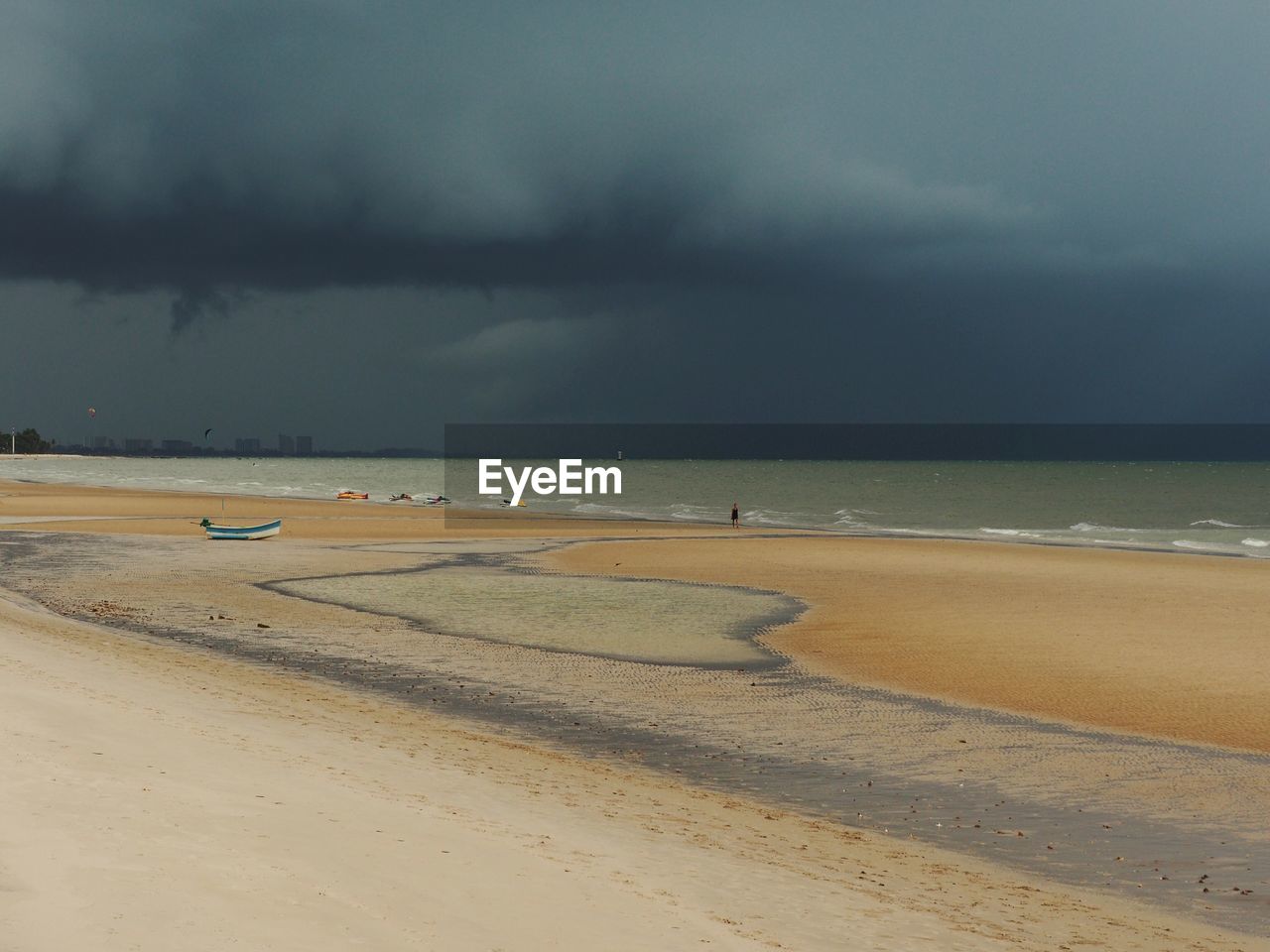 Scenic view of beach against sky