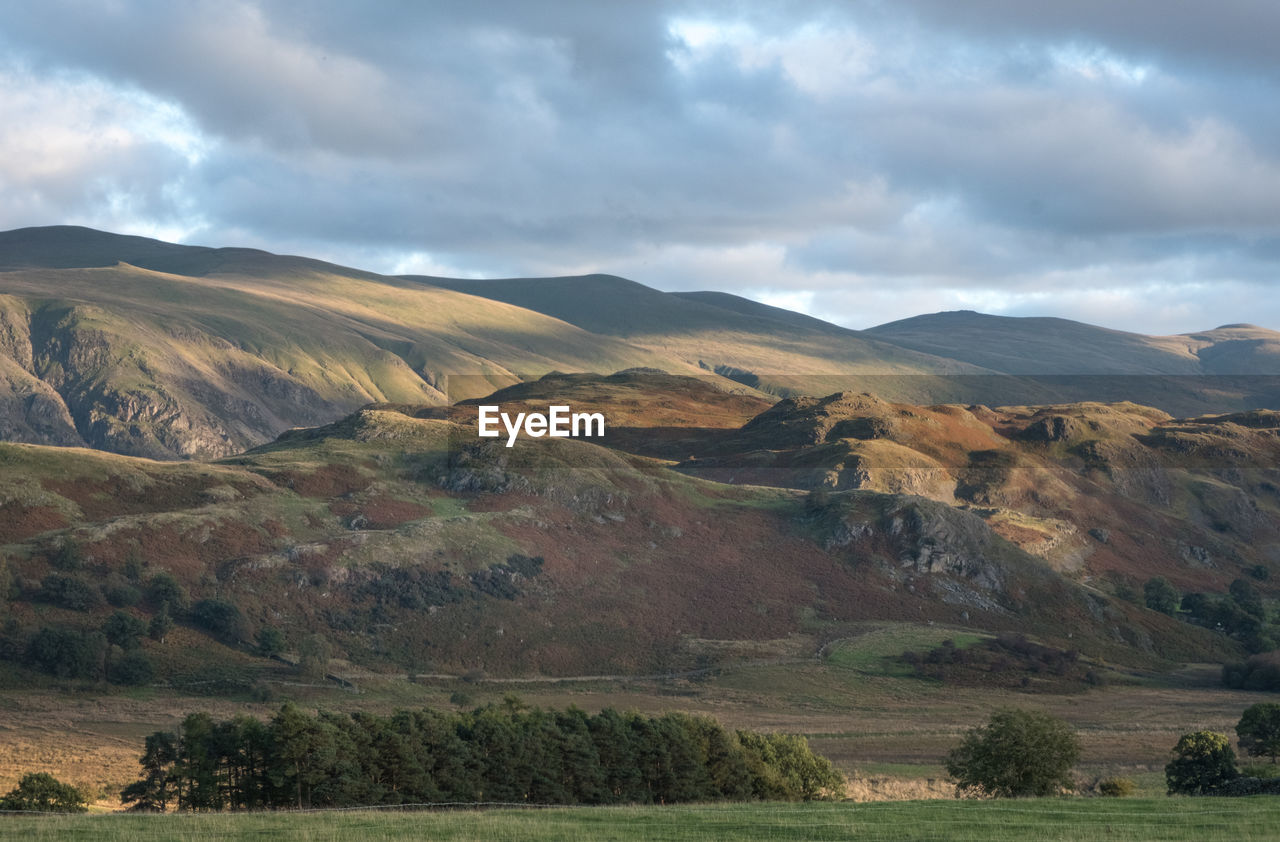 SCENIC VIEW OF MOUNTAIN AGAINST SKY