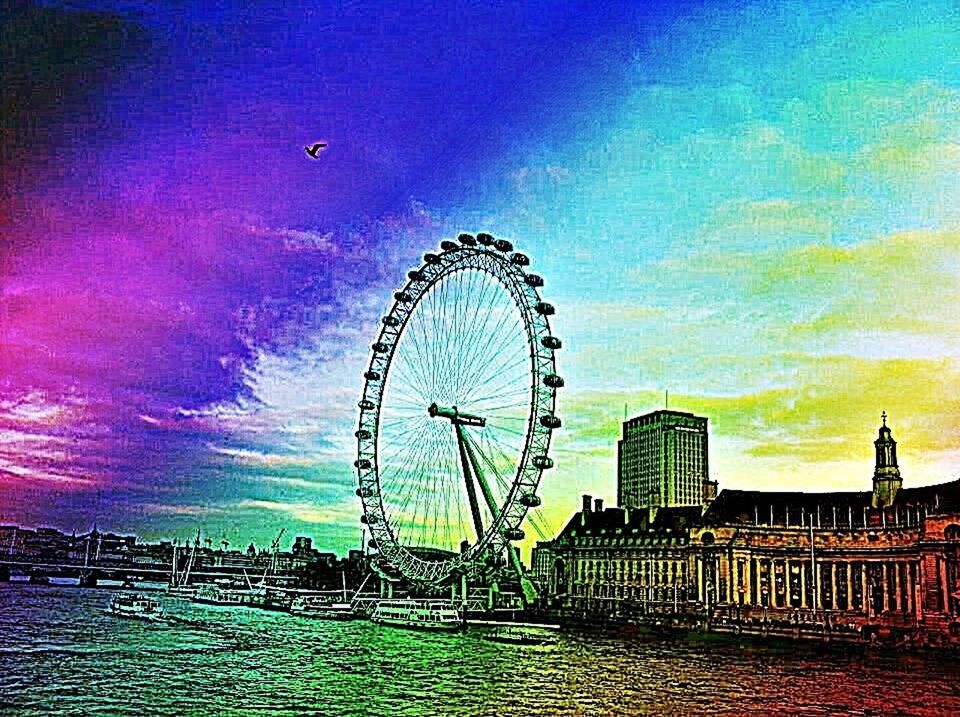 LOW ANGLE VIEW OF FERRIS WHEEL AGAINST SKY