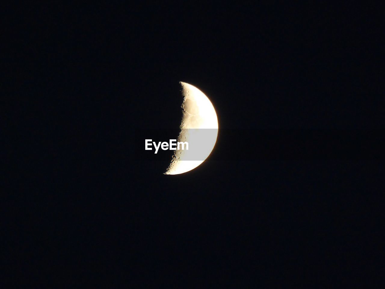 LOW ANGLE VIEW OF MOON IN THE DARK