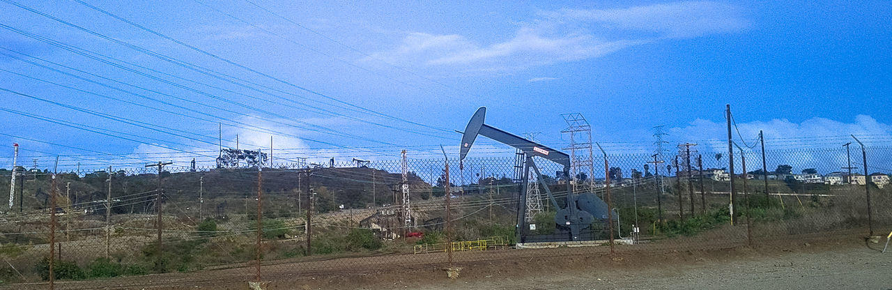 VIEW OF BUILT STRUCTURE AGAINST BLUE SKY