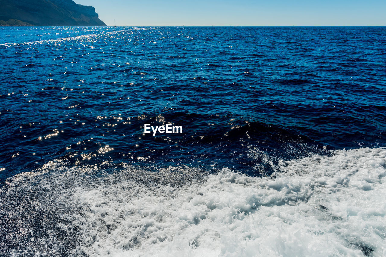 Scenic view of sea against clear sky